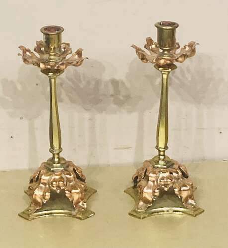Pair of Arts and Crafts brass candlesticks.