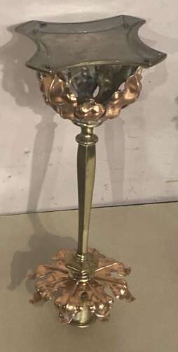 Pair of Arts and Crafts brass candlesticks.