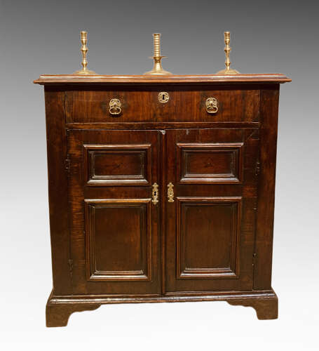 Early walnut two door cupboard.