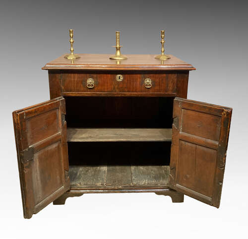 Early walnut two door cupboard.