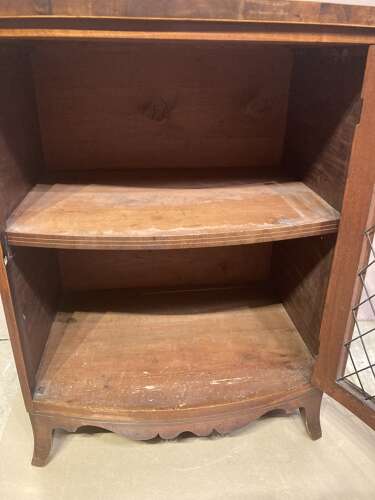Small Regency bow fronted mahogany side cabinet.