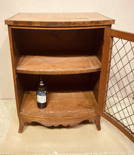 Small Regency bow fronted mahogany side cabinet.