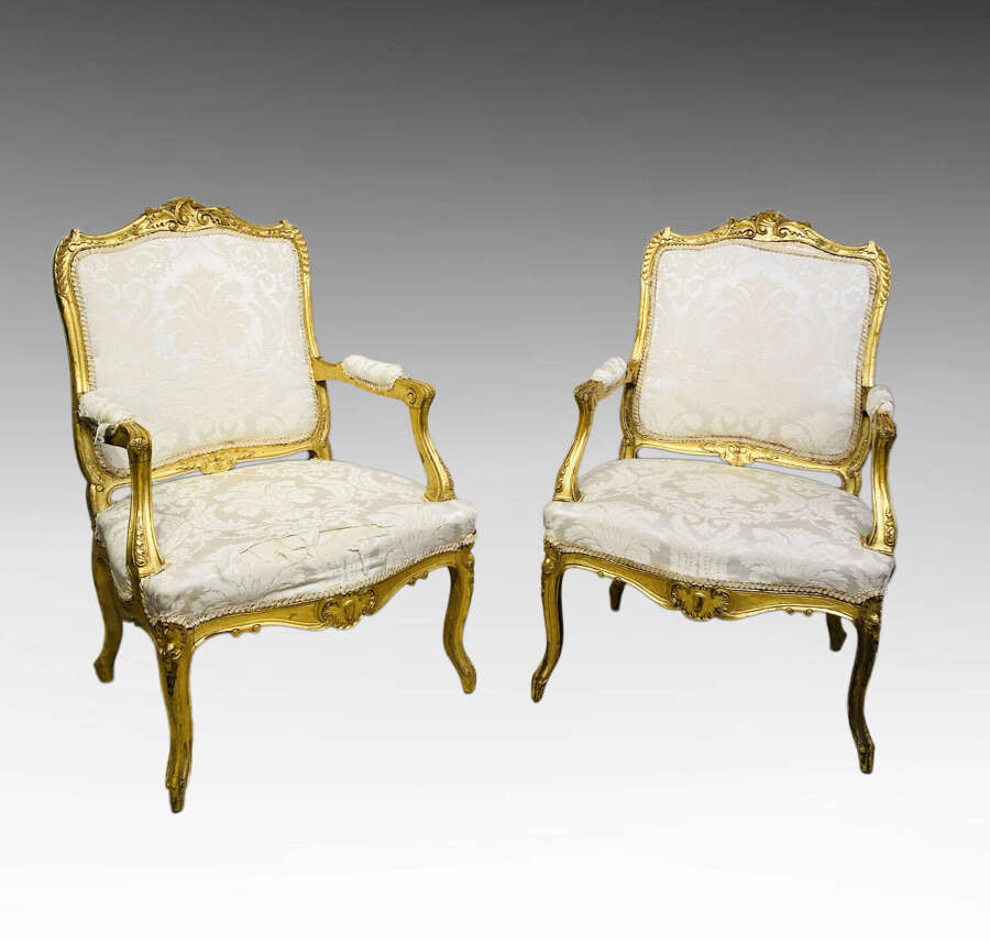 Pair of French carved giltwood armchairs.