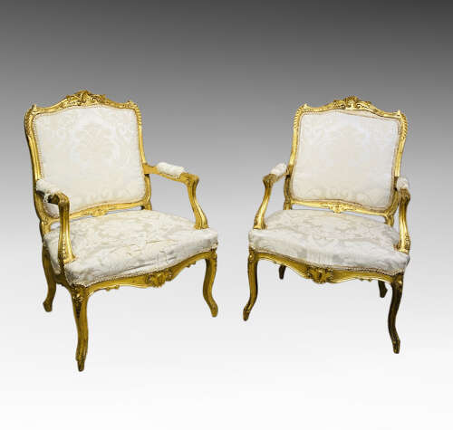 Pair of French carved giltwood armchairs.