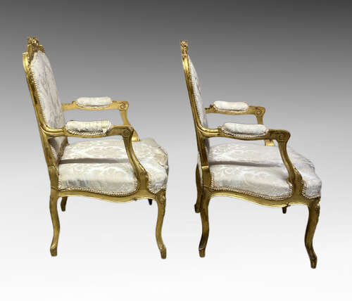 Pair of French carved giltwood armchairs.