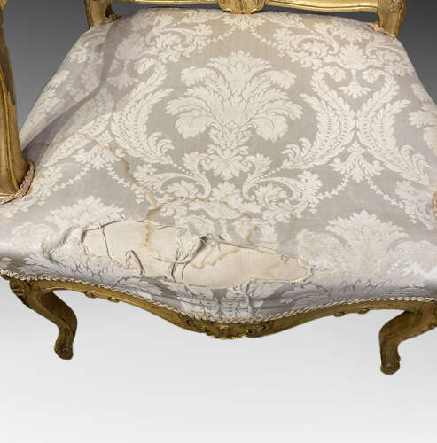 Pair of French carved giltwood armchairs.