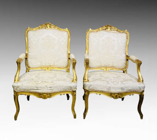 Pair of French carved giltwood armchairs.