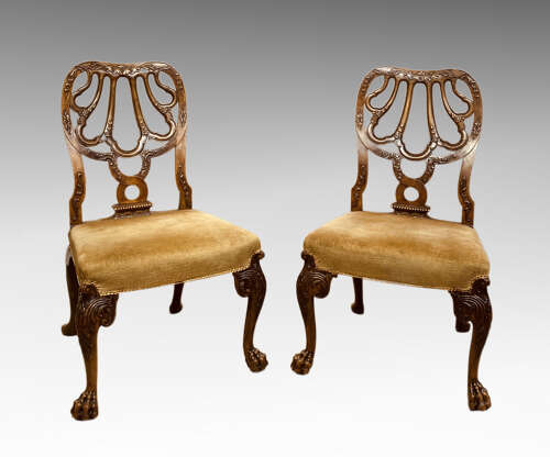 Pair of Giles Grendey carved walnut side chairs.