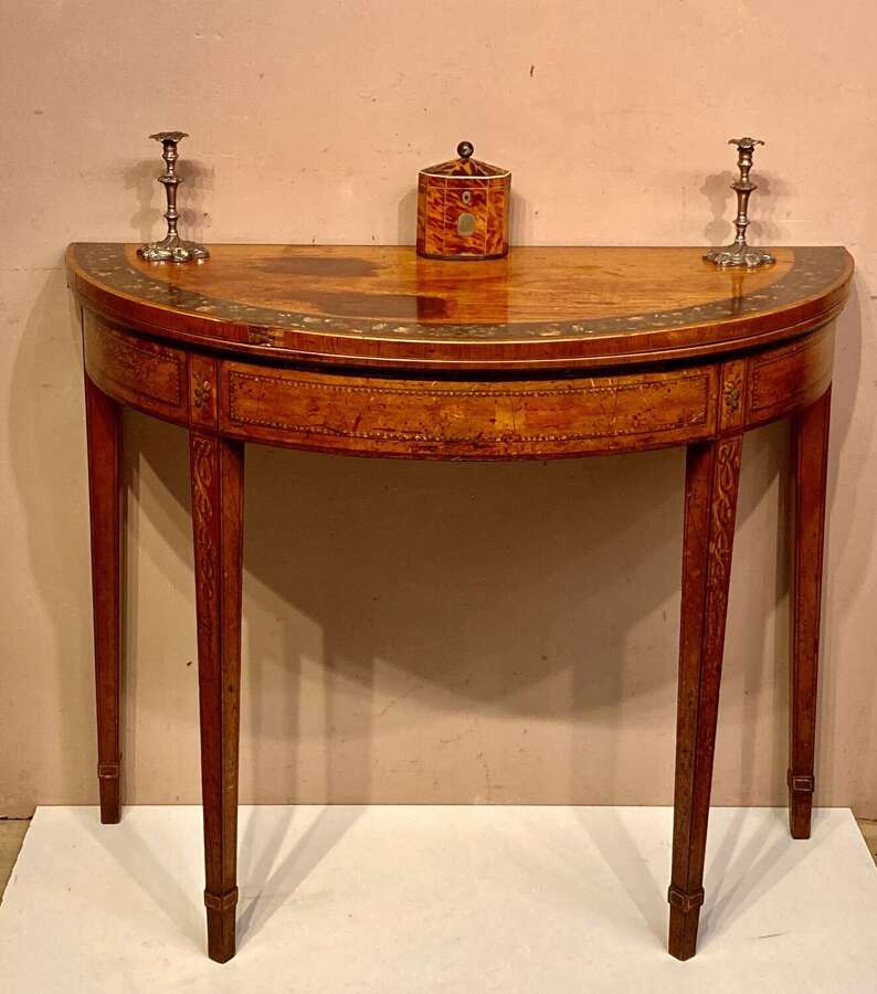 Georgian painted satinwood demi lune card table.