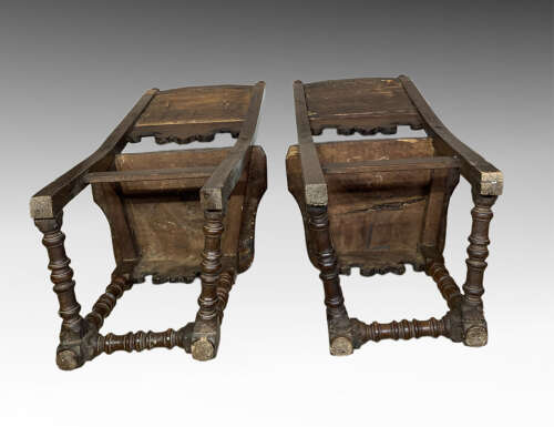 Pair of early continental walnut side chairs.